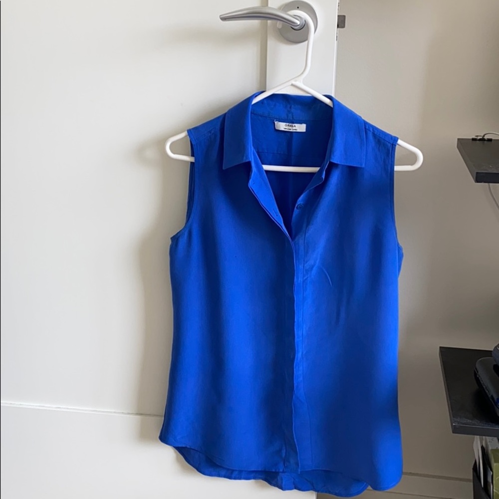 Grana 100% silk sleeveless bottom down shirt, blue